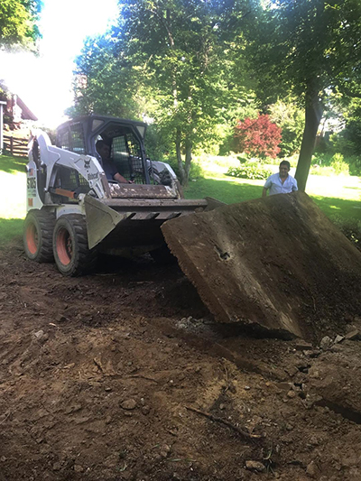 cracked driveway removal with bobcat fairfax va